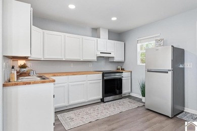 Looking for a lake house getaway? This newly renovated home has - photo 10