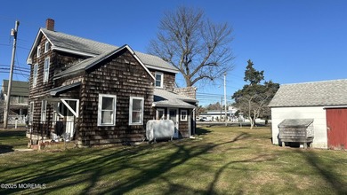 Built in 1859 and set on just under 2 acres, this Manahawkin - photo 6