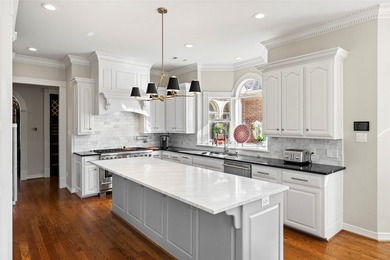Experience the pinnacle of refined living in this meticulously - photo 15