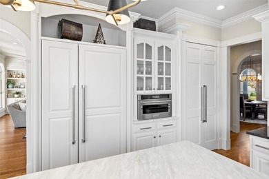 Experience the pinnacle of refined living in this meticulously - photo 17