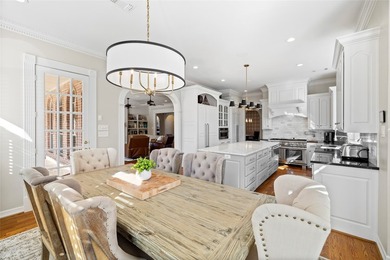 Experience the pinnacle of refined living in this meticulously - photo 19