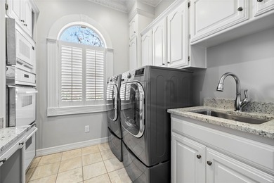 Experience the pinnacle of refined living in this meticulously - photo 34