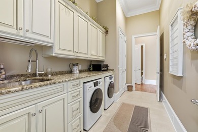 Set on the 11th fairway of The Reserve, 681 Reserve Drive is an - photo 24
