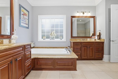 Set on the 11th fairway of The Reserve, 681 Reserve Drive is an - photo 28