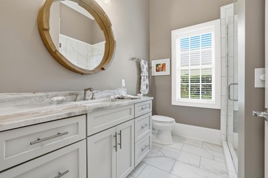 Set on the 11th fairway of The Reserve, 681 Reserve Drive is an - photo 32