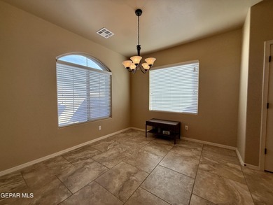 Beautiful single-story Cimarron home offering exceptional curb