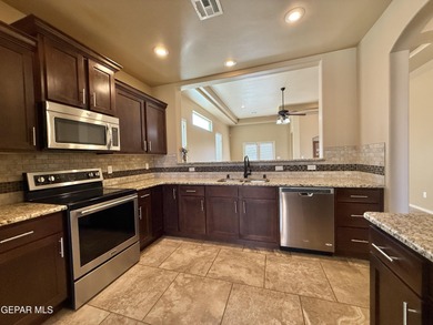 Beautiful single-story Cimarron home offering exceptional curb