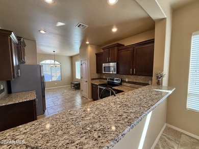 Beautiful single-story Cimarron home offering exceptional curb