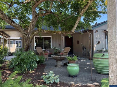 Welcome to small-town charm in wine country! This beautiful