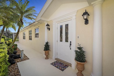 Lake Home For Sale in Palm Beach Gardens, Florida