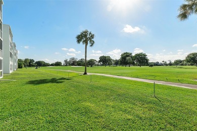 Bright and Stunning Corner unit with lake & Golf views, located