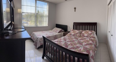 Bright and Stunning Corner unit with lake & Golf views, located