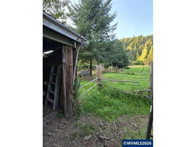 Manufactured home offering 3 bedrooms and 2 baths on 1.89 acres