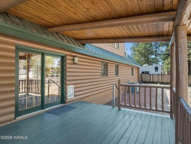 Welcome home to a rare true log cabin, perfectly situated across - photo 23