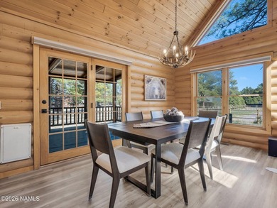 Welcome home to a rare true log cabin, perfectly situated across - photo 24