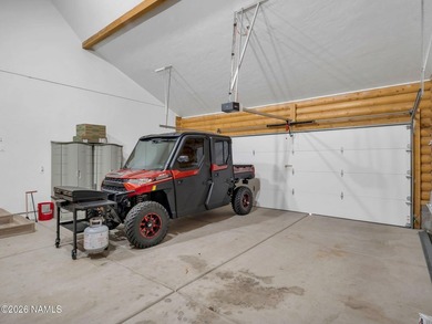 Welcome home to a rare true log cabin, perfectly situated across - photo 25