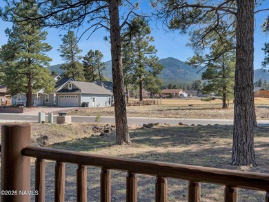 Welcome home to a rare true log cabin, perfectly situated across - photo 26