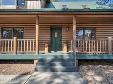 Welcome home to a rare true log cabin, perfectly situated across - photo 27