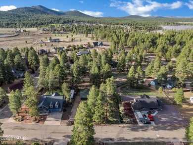 Welcome home to a rare true log cabin, perfectly situated across - photo 28
