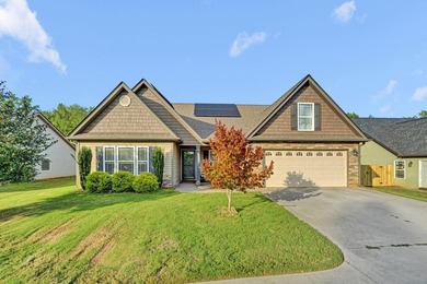 This spacious three-bedroom, two-and-a-half bath ranch on a - photo 1