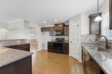 This spacious three-bedroom, two-and-a-half bath ranch on a - photo 4