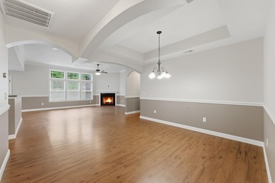 This spacious three-bedroom, two-and-a-half bath ranch on a - photo 8