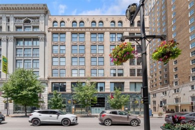 Live in the heart of downtown in an amazing building and save on