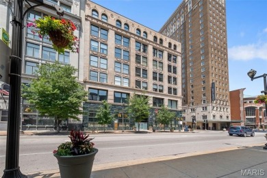 Live in the heart of downtown in an amazing building and save on