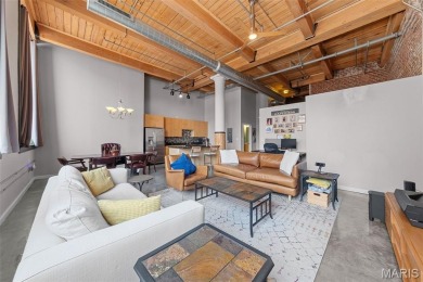 Live in the heart of downtown in an amazing building and save on