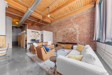 Live in the heart of downtown in an amazing building and save on