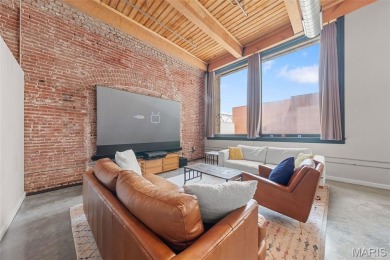 Live in the heart of downtown in an amazing building and save on