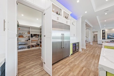 A statement of modern waterfront luxury, this extraordinary - photo 14