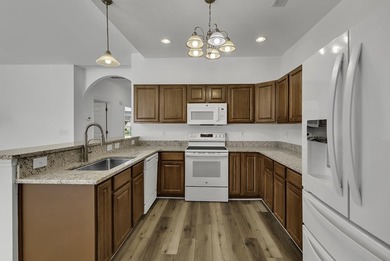 Welcome to this charming 3-bedroom, 2-bath home featuring a - photo 16