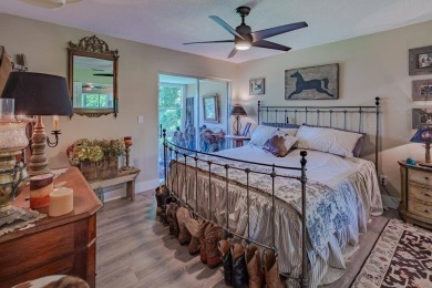 Beautifully updated 2BD/2BA corner residence featuring impact - photo 14