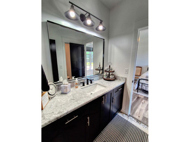 Only two years new and move-in ready, this custom-built ranch - photo 25