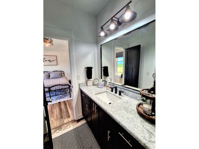 Only two years new and move-in ready, this custom-built ranch - photo 30