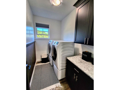 Only two years new and move-in ready, this custom-built ranch - photo 31