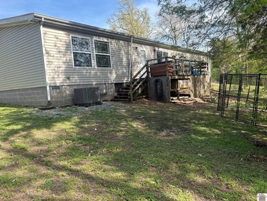 This 3BR, 2 BA Manufactured home sits on a permanent foundation - photo 4