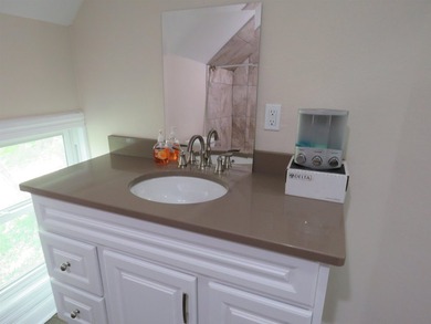 Beautifully remodeled 1 1/2 story home situated on 50 feet of - photo 16