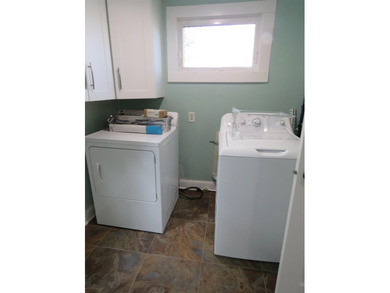 Beautifully remodeled 1 1/2 story home situated on 50 feet of - photo 24