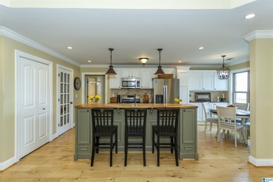 Experience lake living at its finest on year-round water on the - photo 12