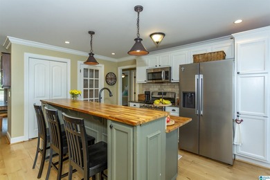 Experience lake living at its finest on year-round water on the - photo 13