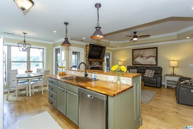 Experience lake living at its finest on year-round water on the - photo 14
