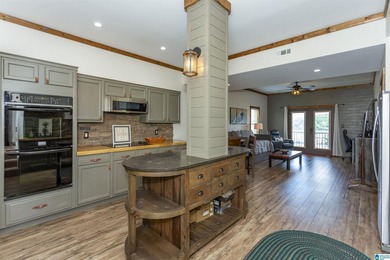 Experience lake living at its finest on year-round water on the - photo 32