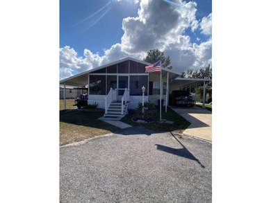This home offers 2 bedrooms & 2 bathrooms on a quiet road with - photo 2