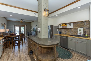 Experience lake living at its finest on year-round water on the - photo 33