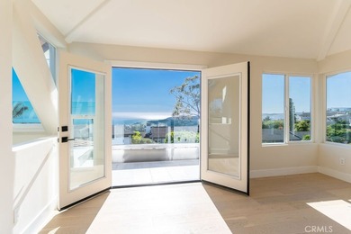 This newly renovated home with breathtaking 180-degree ocean - photo 1