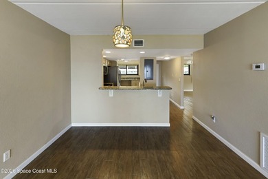 Welcome to this beautifully updated first-floor riverfront condo - photo 24
