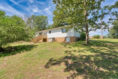 Nestled on 1.7 scenic acres in Hot Springs, Arkansas, this - photo 2