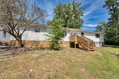 Nestled on 1.7 scenic acres in Hot Springs, Arkansas, this - photo 3